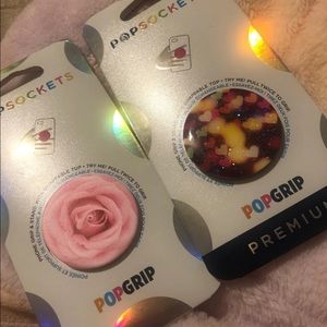 Two brand new in package pop sockets